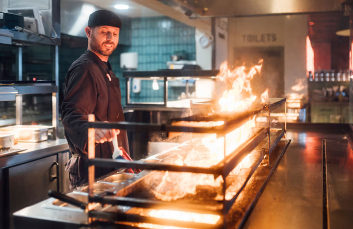 Firejacks chef preparing meat